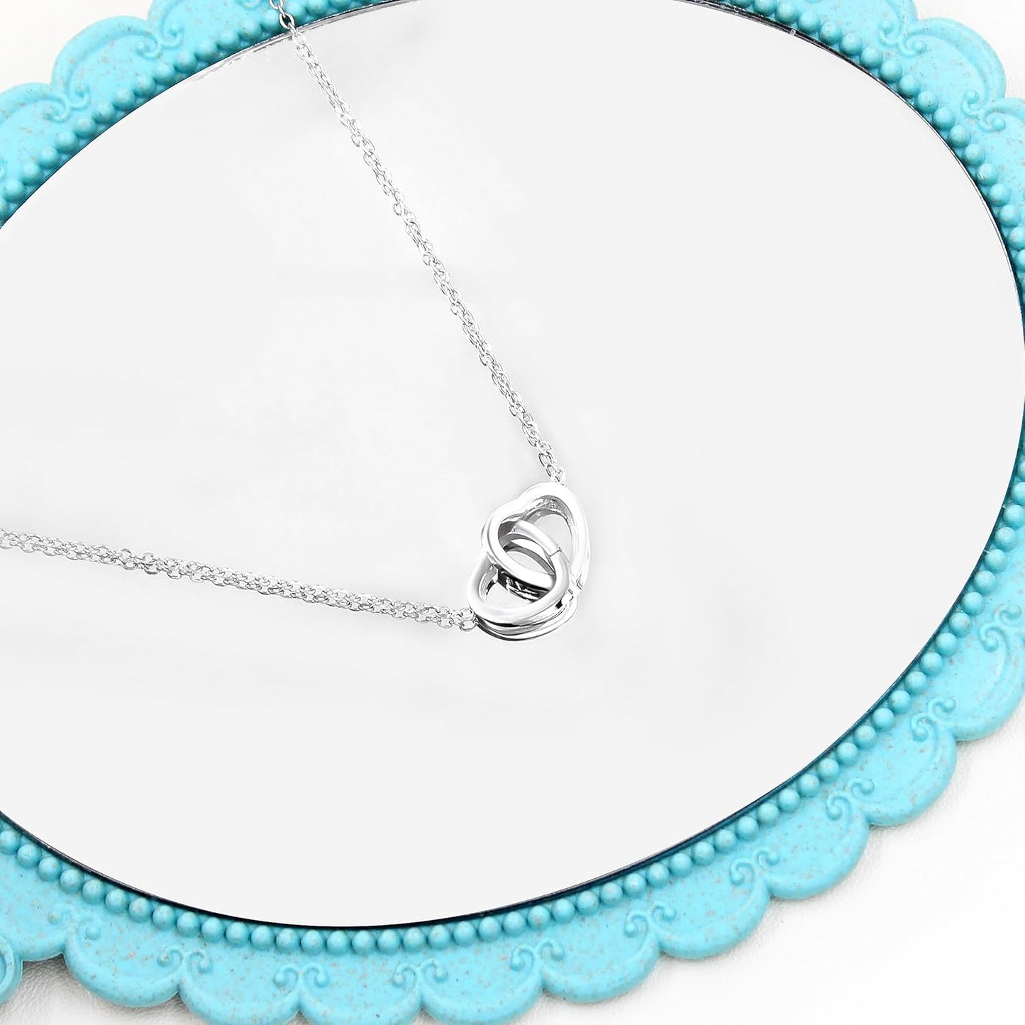 Here’s a revised version:  "Personalized Custom Engraved Interlocking Heart Necklace Featuring Two Names – Double Love Pendant Choker for Collarbone"